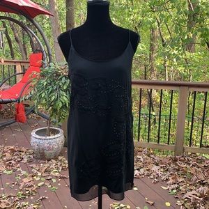 Jenny Hahn sheer black slip dress with beaded detail.